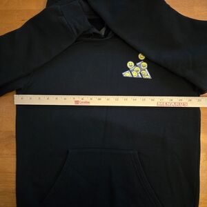 Adidas men's Optimoticons graphic fleece hoodie in black. Size Small